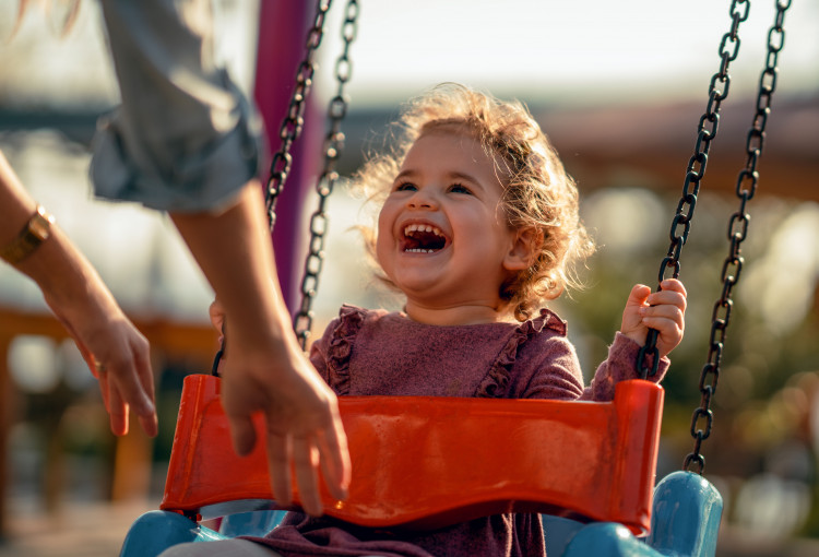 Girl on Swing Stock Image LR